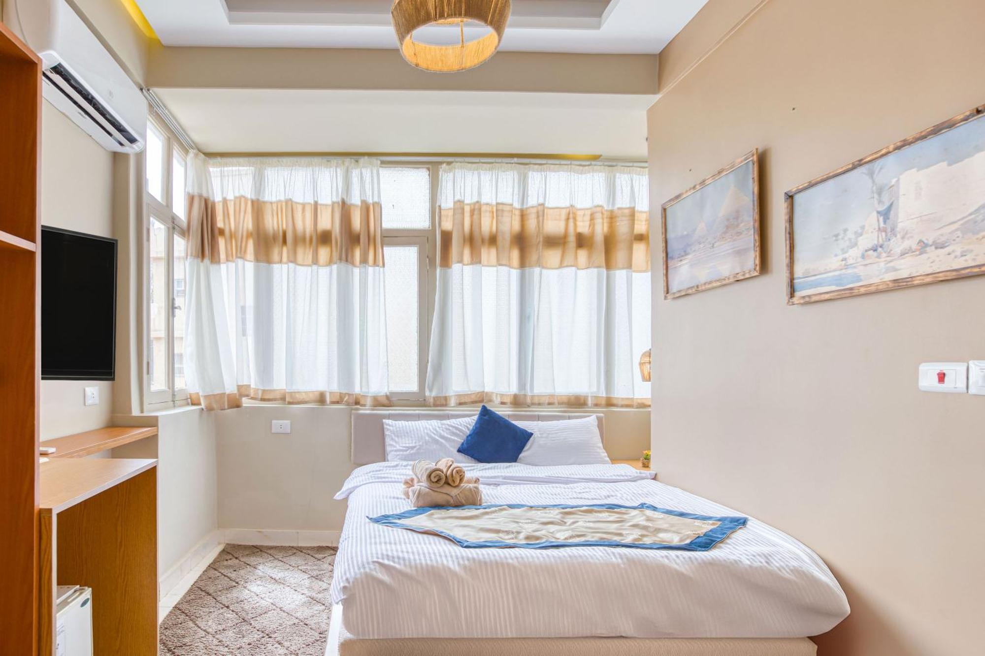 The Grand Pyramids View Hotel Kafret el-Gabal Стая снимка