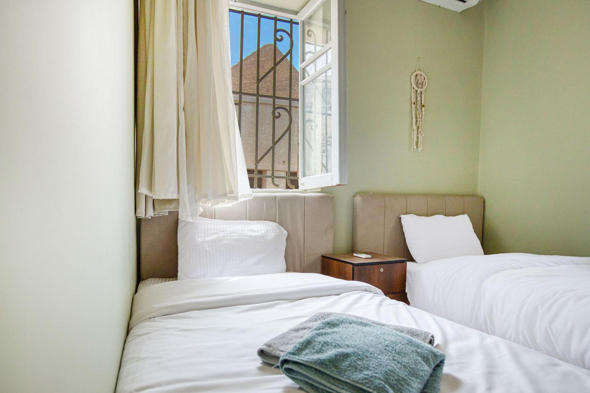 The Grand Pyramids View Hotel Kafret el-Gabal Стая снимка
